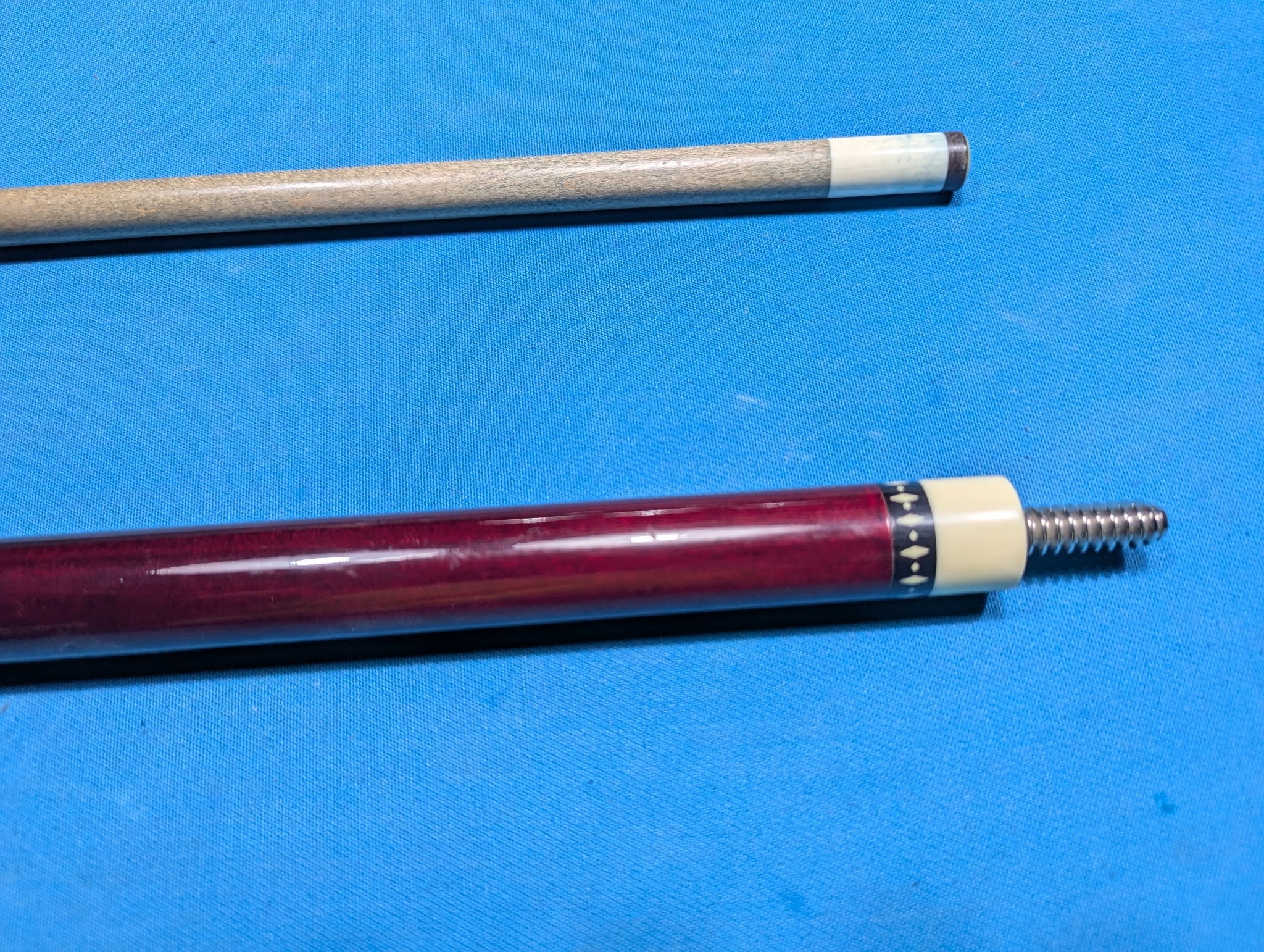 McDermott Lucky cue burgundy with a black linen wrap